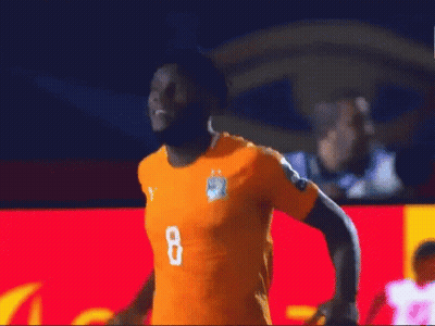 A Soccer Player With The Number 8 On His Jersey Is Running On The Field GIF