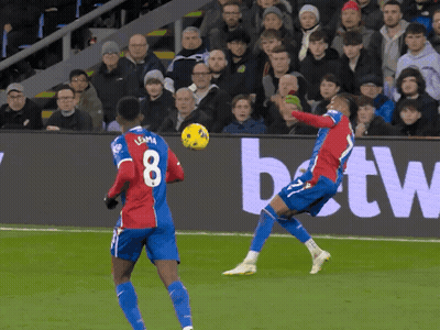 A Soccer Player With The Number 8 On His Jersey Kicks The Ball GIF