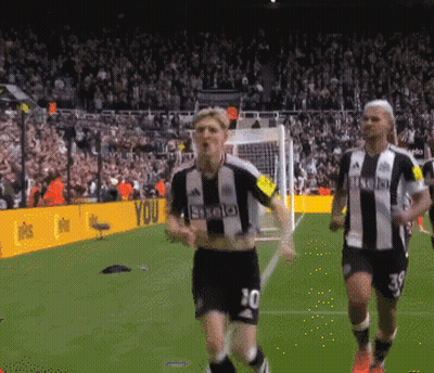 A Soccer Player With The Number 80 On His Shorts Is Running Towards The Goal GIF