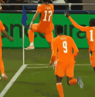 A Soccer Player With The Number 9 On His Jersey Is Jumping In The Air GIF