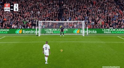 A Soccer Player With The Number 9 On His Jersey Stands In Front Of A Goal GIF