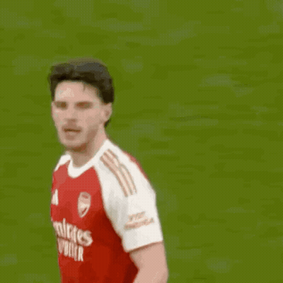 A Soccer Player With The Number 9 On His Shorts Jumps Into The Air GIF