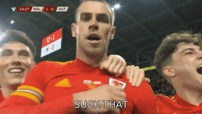 A Soccer Player With The Word Suck That Written On His Chest GIF