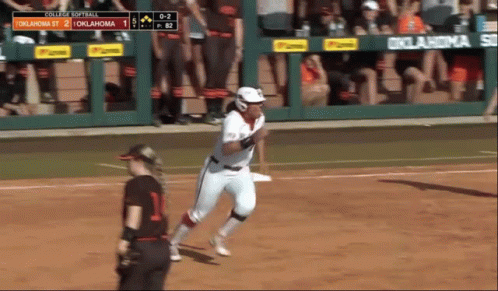 A Softball Game Is Being Played Between Oklahoma St And College Softball GIF
