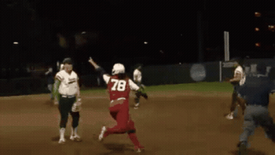A Softball Player Wearing Number 78 Is Running Towards The Base GIF