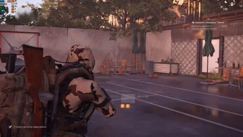 A Soldier In A Video Game Is Standing In A Yard GIF