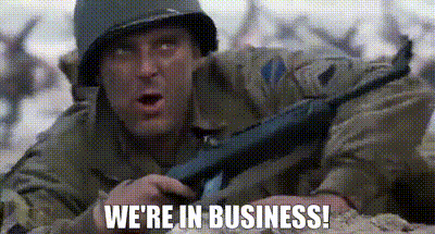 A Soldier Is Holding A Gun And Says `` We 'Re In Business ! '' GIF