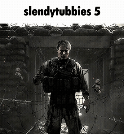A Soldier Is Standing In Front Of A Barbed Wire Fence Holding A Gun . GIF