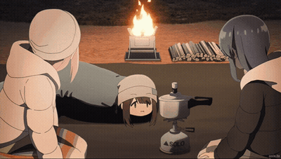 A Solo Gas Stove Sits In Front Of A Fire GIF
