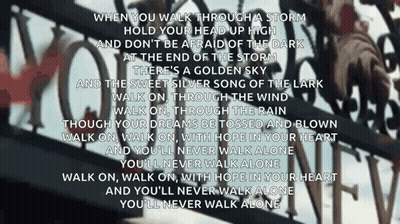 A Song That Says When You Walk Through A Storm Hold Your Head Up High And Don 'T Be Afraid Of The Dark GIF