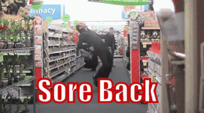 A Sore Back Sign Is Displayed In A Grocery Store GIF