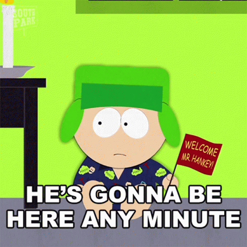 A South Park Character Holding A Welcome Mr. Hankey Sign GIF
