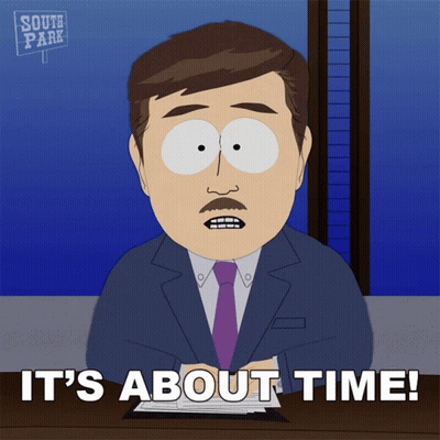 A South Park Character Says It 'S About Time While Sitting At A Desk GIF