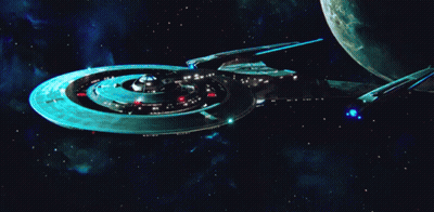 A Space Ship With A Blue Light Coming Out Of The Side GIF