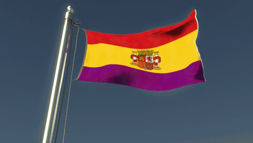 A Spanish Flag Is Waving In The Wind With A Blue Sky In The Background GIF
