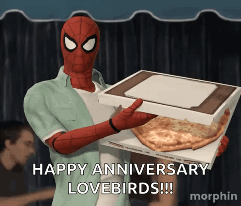 A Spider Man Holding A Box Of Pizza With The Words Happy Anniversary Lovebirds Written Below Him GIF