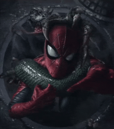 A Spider Man Holding A Green Snake In His Hands GIF