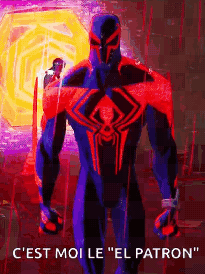 A Spider-Man In A Purple And Red Suit Is Standing In A Room With A Sword In His Hand . GIF