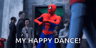 A Spider-Man Is Dancing In Front Of A Crowd Of People And Says `` My Happy Dance ! '' GIF