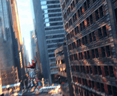 A Spider-Man Is Flying Through The Air In A City GIF