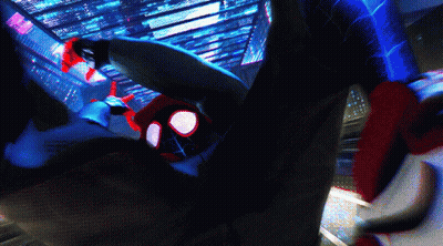 A Spider-Man Is Flying Through The Air While Wearing A Mask GIF