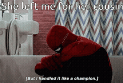 A Spider Man Sitting In A Bathtub With His Head Down GIF