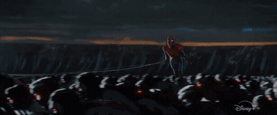 A Spiderman Is Flying Through The Air With A Disney + Logo In The Background . GIF