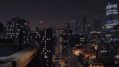 A Spiderman Is Holding A Box Of Pizza In His Hand GIF