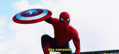 A Spiderman Is Holding A Shield And Saying Hey Everyone GIF