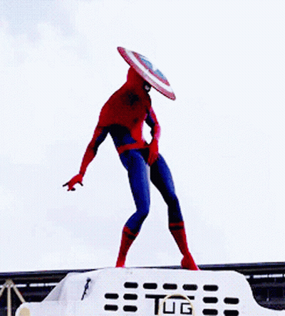 A Spiderman With A Shield On His Head Is Standing On Top Of A Tug GIF