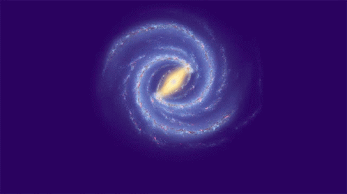 A Spiral Galaxy With A Yellow Center Is Shown GIF