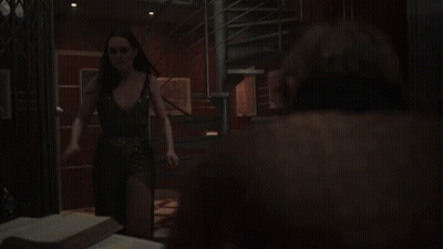 A Spiral Staircase In A Dark Room With A Compass In The Middle GIF