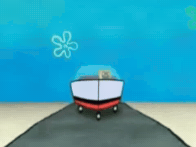 A Spongebob Squarepants Boat Is Driving Down A Beach GIF