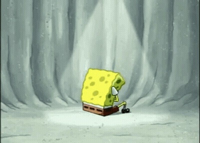 A Spongebob Squarepants Character Is Sitting In The Snow . GIF
