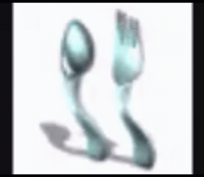 A Spoon And A Fork With A Foot In The Background GIF