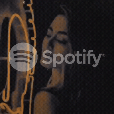 A Spotify Logo Is Displayed On A Dark Background GIF