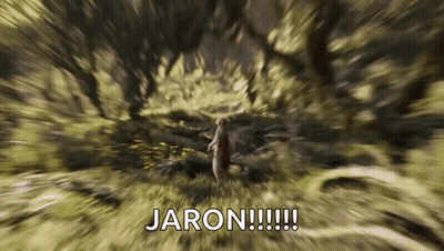 A Squirrel Is Walking Through A Forest With The Words `` Jaron !!! '' Written On The Bottom . GIF