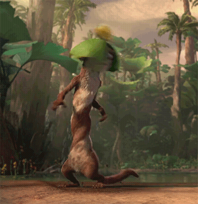A Squirrel With A Green Leaf On Its Head Is Dancing In The Woods GIF