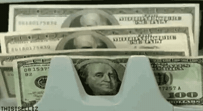 A Stack Of 100 Dollar Bills Is Being Counted By A Machine GIF