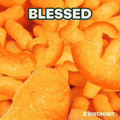 A Stack Of Chocolate Chip Cookies With The Word Blessed On Top GIF