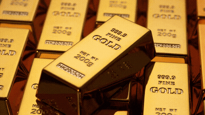 A Stack Of Gold Bars Including One From 2008 GIF