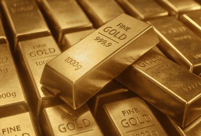 A Stack Of Gold Bars That Are 999.9 Fine Gold GIF