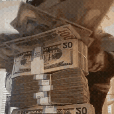 A Stack Of Hundred Dollar Bills Stacked On Top Of A Stack Of Fifty Dollar Bills GIF