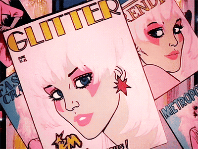 A Stack Of Magazines Including One Called Glitter GIF