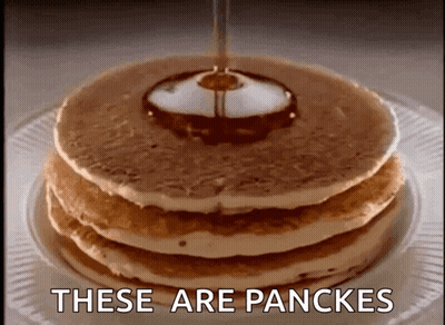 A Stack Of Pancakes With Syrup Being Poured On Top With The Words These Are Pancakes Written Below Them GIF