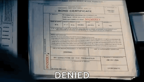 A Stack Of Papers With The Word Denied On It GIF