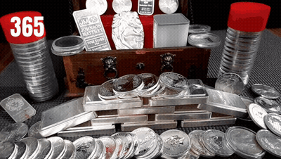 A Stack Of Silver Coins With A Jm Johnson Matthew Coin In The Background GIF