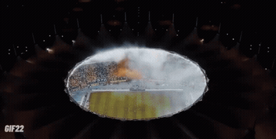 A Stadium Full Of People With A Banner That Says ' Nas ' On It GIF