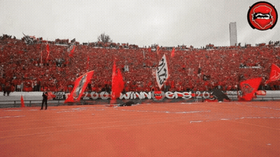 A Stadium Full Of People With A Banner That Says Winners 20 GIF