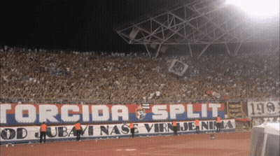 A Stadium With A Banner That Says " Corcida Split " GIF